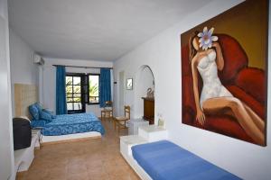 Postel nebo postele na pokoji v ubytování Assa Maris Beach Hotel