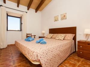 A bed or beds in a room at Villa Paula