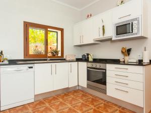 A kitchen or kitchenette at Villa Paula