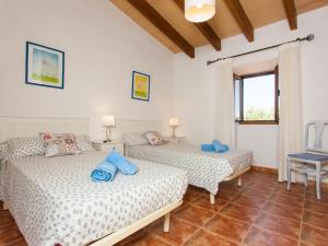 A bed or beds in a room at Villa Paula