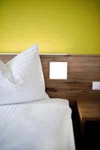 Postel nebo postele na pokoji v ubytování Basic Hotel Innsbruck