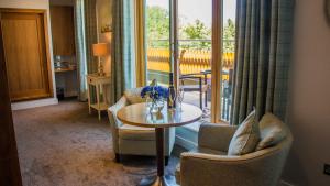 Area soggiorno di Manor West Hotel & Leisure Club