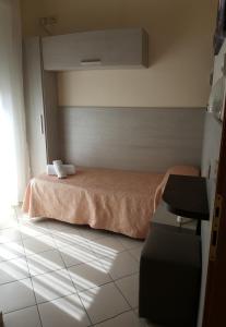 Postel nebo postele na pokoji v ubytování Hotel Senyor