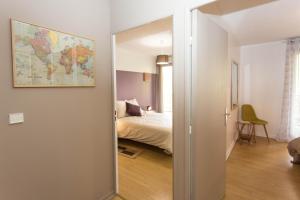 Postel nebo postele na pokoji v ubytování Appartement Lyon Centre Confluence 100 m2 Parking Terrasses