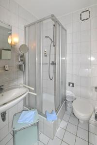 Ein Badezimmer in der Unterkunft Phoenix Hotel Schäfereck