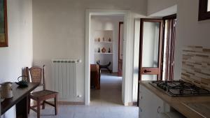 Kuchyň nebo kuchyňský kout v ubytování B&B Le Due Corti