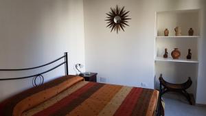 Postel nebo postele na pokoji v ubytování B&B Le Due Corti