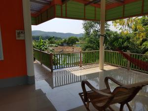 Balkón nebo terasa v ubytování Baan Pak Phutawan Resort