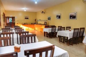 ห้องอาหารหรือที่รับประทานอาหารของ Pousada Canto do Rio