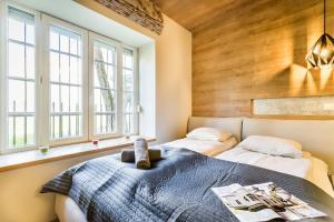 Posteľ alebo postele v izbe v ubytovaní BpR Pixies Design Home