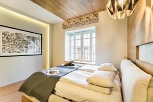 Posteľ alebo postele v izbe v ubytovaní BpR Pixies Design Home
