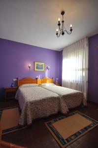 Postel nebo postele na pokoji v ubytování Hotel Alonso