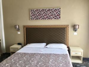 Postel nebo postele na pokoji v ubytování Park Hotel Castello