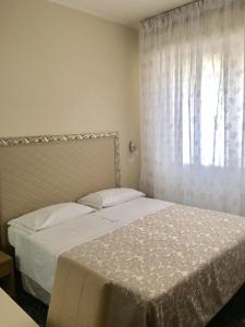 Postel nebo postele na pokoji v ubytování Park Hotel Castello