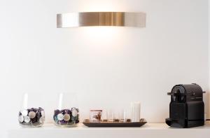 Coffee and tea making facilities at 111 ColaDiRienzo Rooms - by AD Roma