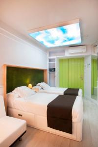 Posteľ alebo postele v izbe v ubytovaní Hotel Ribes Roges