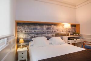 Posteľ alebo postele v izbe v ubytovaní Hotel Ribes Roges