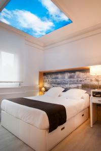 Posteľ alebo postele v izbe v ubytovaní Hotel Ribes Roges