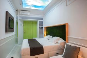 Posteľ alebo postele v izbe v ubytovaní Hotel Ribes Roges