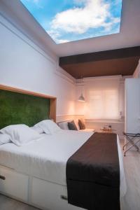 Posteľ alebo postele v izbe v ubytovaní Hotel Ribes Roges