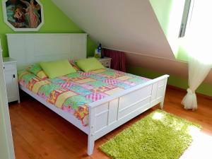 Postel nebo postele na pokoji v ubytování Apartment Silvia