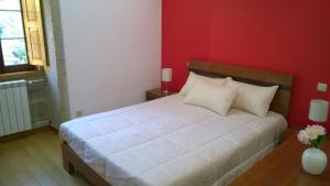 Postel nebo postele na pokoji v ubytování Casa das Neves + 20 fotografií