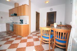 Kuchyň nebo kuchyňský kout v ubytování Apartmani Amado/Lozic
