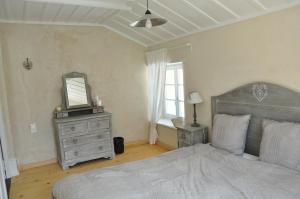 Postel nebo postele na pokoji v ubytování Relais de la Baume