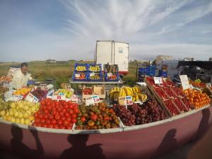 a display of fruits and vegetables at a market at Fresa Apartaments in La Mata