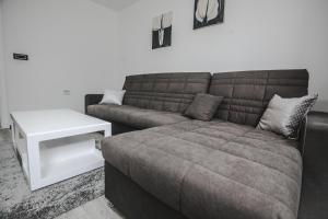 Posezení v ubytování Kristal Apartmani