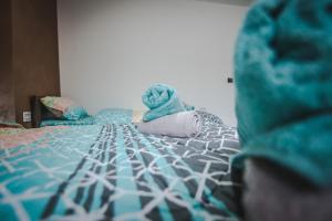 Postel nebo postele na pokoji v ubytování Kristal Apartmani