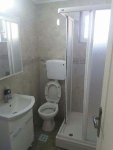 Ванная комната в Apartments Dragan