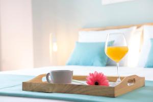 Postel nebo postele na pokoji v ubytování Alegria Boutique Villas