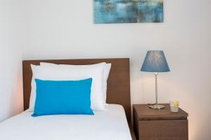 Postel nebo postele na pokoji v ubytování Alegria Boutique Villas