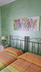 En eller flere senge i et værelse på B&B Cuoreverde Pollino