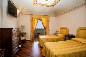 TV a/nebo společenská místnost v ubytování Hotel Tritone Lipari