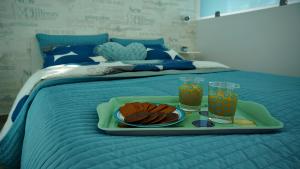 Uma cama ou camas num quarto em THE BLUE VIEW MASPALOMAS