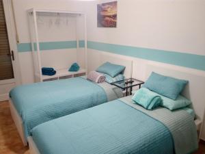Кровать или кровати в номере Ivrea la Bella