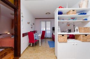 Ένα ή περισσότερα κρεβάτια σε δωμάτιο στο Apartments Branka