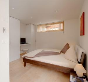 Ein Bett oder Betten in einem Zimmer der Unterkunft Apartment Meric Superior
