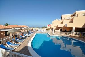 Bazén v ubytovaní Paradise Court Las Americas WiFi Pool 57 alebo v jeho blízkosti