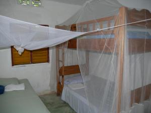 A bed or beds in a room at Ecotopía Park