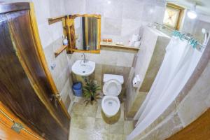 A bathroom at Lazi Beach Club Resort