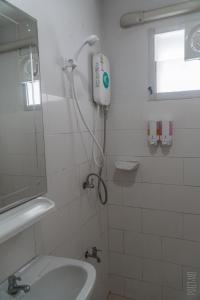 Ett badrum på Noble U-house Chiangmai