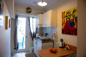 Η κουζίνα ή μικρή κουζίνα στο Patras Centre Apartment