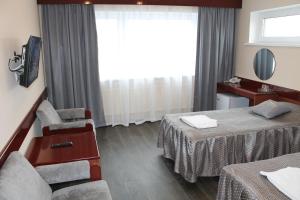 TV a/nebo společenská místnost v ubytování Hotel Druzhba