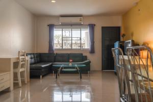 Postel nebo postele na pokoji v ubytování Noble House Chiangmai
