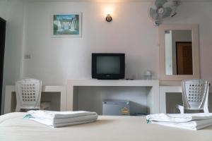 TV a/nebo společenská místnost v ubytování Noble House Chiangmai