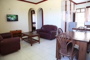 A seating area at Prestige Leisure Hotel