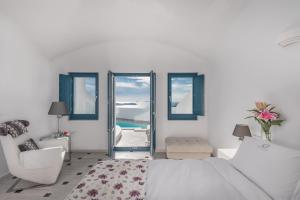 Postel nebo postele na pokoji v ubytování Anteliz Suites + 37 fotografií